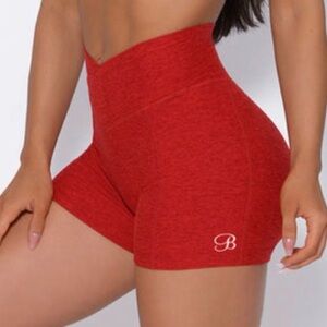𝐵𝑜𝓂𝒷𝓈𝒽𝑒𝓁𝓁 𝒮𝓅𝑜𝓇𝓉𝓈𝓌𝑒𝒶𝓇 Tiny Waist Shorts in Sunset Red